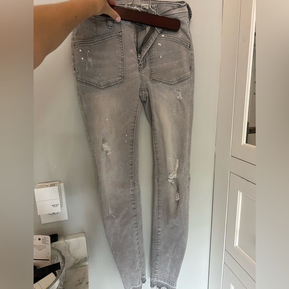 Grey paint spattered jeans Free people